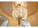 Close-up of an ornate, detailed chandelier at 5174 Vardon Dr, Windermere, FL 34786