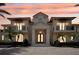 Stunning two-story home with a grand entrance and meticulously landscaped grounds at 5174 Vardon Dr, Windermere, FL 34786