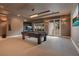 Game room with a pool table, built-in bar, and access to an outdoor patio at 5174 Vardon Dr, Windermere, FL 34786