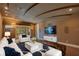 Spacious home theater featuring plush seating and a large TV at 5174 Vardon Dr, Windermere, FL 34786