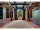 Luxurious library with extensive built-in shelving and hardwood floors at 5174 Vardon Dr, Windermere, FL 34786