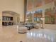 Light and airy living room with a sectional sofa and large windows at 5174 Vardon Dr, Windermere, FL 34786