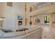 Bright living area with a fireplace and high ceilings at 5174 Vardon Dr, Windermere, FL 34786