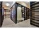 Large walk-in Primary closet with ample shelving and hanging space at 5174 Vardon Dr, Windermere, FL 34786