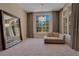 Sitting room with large mirror and chaise lounge at 5174 Vardon Dr, Windermere, FL 34786