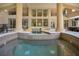 An outdoor spa with a view of the home's back at 5174 Vardon Dr, Windermere, FL 34786