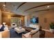 Home theater with comfortable seating and large screen TV at 5174 Vardon Dr, Windermere, FL 34786
