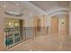 Upper hallway overlooking a pool and living area at 5174 Vardon Dr, Windermere, FL 34786
