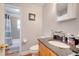 Clean bathroom with granite countertop and tub shower combo at 8116 Powell Dr, Orlando, FL 32822
