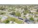 Wide aerial view of neighborhood including subject property at 8116 Powell Dr, Orlando, FL 32822