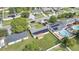 Aerial view of house, yard, pool, and neighborhood at 8116 Powell Dr, Orlando, FL 32822
