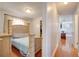 Bedroom with light wood furniture and access to hallway at 8116 Powell Dr, Orlando, FL 32822