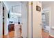 Hallway view of living room and bathroom at 8116 Powell Dr, Orlando, FL 32822