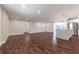 Open living space with dark hardwood floors and kitchen island at 5709 Ridgeway Dr, Orlando, FL 32819