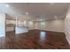 Open living room with kitchen and island, hardwood floors, and recessed lighting at 5709 Ridgeway Dr, Orlando, FL 32819