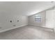 Laundry room with tile flooring and window at 5709 Ridgeway Dr, Orlando, FL 32819
