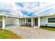 Updated home with attached garage and welcoming front entrance at 5709 Ridgeway Dr, Orlando, FL 32819