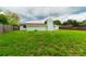 House with large backyard and grassy area at 5709 Ridgeway Dr, Orlando, FL 32819