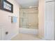 Bathroom with a shower/tub combination and neutral decor at 70 Millholland St, Oakland, FL 34760