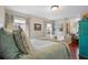 Spacious bedroom with a comfortable bed and plenty of natural light at 70 Millholland St, Oakland, FL 34760