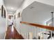 Bright hallway with hardwood floors and access to other rooms at 70 Millholland St, Oakland, FL 34760