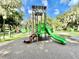 Play area with slides and climbing structures for children of all ages at 70 Millholland St, Oakland, FL 34760