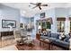 Comfortable living room with a view into the dining area and kitchen at 130 Golf Vista Cir, Davenport, FL 33837