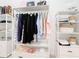 Well-organized walk-in closet with custom shelving and hanging rods at 8920 Dove Valley Way, Davenport, FL 33896