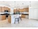Eat-in kitchen with stainless steel appliances and an island with seating at 8920 Dove Valley Way, Davenport, FL 33896