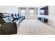 Home theater with reclining seats and large screen at 8920 Dove Valley Way, Davenport, FL 33896