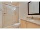 Bathroom with granite countertop and glass shower at 5174 Vardon Dr, Windermere, FL 34786