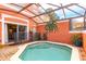 Private screened-in pool and patio area, perfect for relaxation at 3052 Secret Lake Dr, Kissimmee, FL 34747