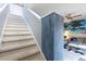 Carpeted stairs leading to the upper level of the home at 3052 Secret Lake Dr, Kissimmee, FL 34747