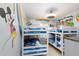 Fun ' bedroom with Mickey Mouse themed bunk beds and artwork at 3052 Secret Lake Dr, Kissimmee, FL 34747