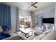 Spacious living room with sliding doors leading to the pool at 3052 Secret Lake Dr, Kissimmee, FL 34747
