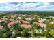 Community overview showcasing lakefront property and lush landscaping at 3052 Secret Lake Dr, Kissimmee, FL 34747