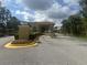 Gated community entrance with landscaping at 3052 Secret Lake Dr, Kissimmee, FL 34747