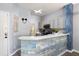 Stylish kitchen with a unique backsplash and breakfast bar at 3052 Secret Lake Dr, Kissimmee, FL 34747
