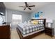 Spacious bedroom with a king-size bed and plenty of natural light at 3052 Secret Lake Dr, Kissimmee, FL 34747