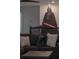 Living room with dark gray sectional sofa and Darth Vader wall art at 9102 Sommerset Hills Dr, Davenport, FL 33896