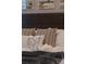 Cozy bedroom with plush bedding and decorative pillows at 9102 Sommerset Hills Dr, Davenport, FL 33896