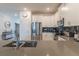Clean and modern kitchen with double sink and white cabinets at 9102 Sommerset Hills Dr, Davenport, FL 33896