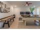 Game room with pool table, shuffleboard, and Star Wars decor at 9102 Sommerset Hills Dr, Davenport, FL 33896