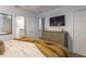 Bedroom with large dresser and yellow blanket at 9102 Sommerset Hills Dr, Davenport, FL 33896