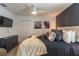 Main bedroom with king-size bed, neutral tones, and modern decor at 9102 Sommerset Hills Dr, Davenport, FL 33896