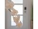 Elegant entryway with white orchids at 9102 Sommerset Hills Dr, Davenport, FL 33896