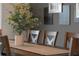 Dining area with a wooden table and neutral decor at 9102 Sommerset Hills Dr, Davenport, FL 33896