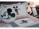 Mickey Mouse bedding with round plush pillow at 9102 Sommerset Hills Dr, Davenport, FL 33896