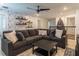 Large game room with sectional sofa, large TV, and views to other rooms at 9102 Sommerset Hills Dr, Davenport, FL 33896