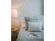 Close-up of a bed with pillows and blankets in a bedroom at 9102 Sommerset Hills Dr, Davenport, FL 33896